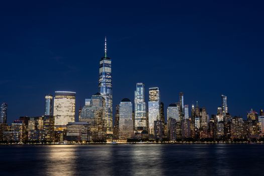 New York City, United States - September 18, 2019: Lower Manhattan skyline at night. View from Jersey City.