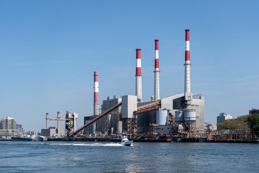 New York, United States of America - September 23, 2019: Ravenswood Generating Station seen from Roosevelt Island.