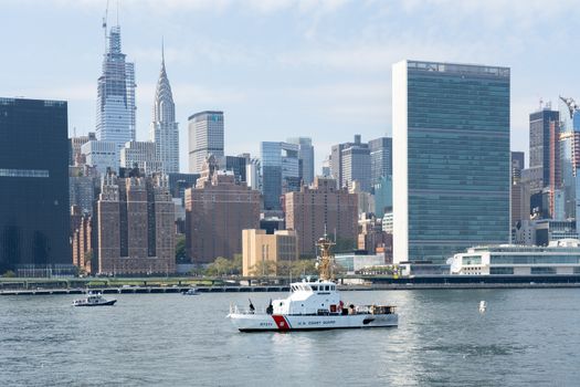 New York, United States of America - September 23, 2019: The U.S. Coast Guard boat Reef Shark in front of the United Nations headquarters.