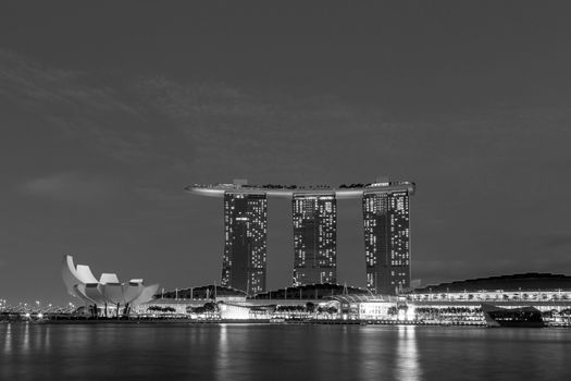 Singapore, Singapore - January 30, 2015: Black and white shot of Marina Bay Sands hotel by night
