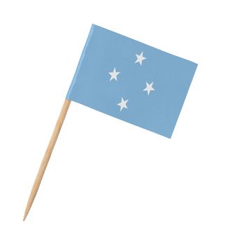 Small paper flag of Micronesia on wooden stick, isolated on white
