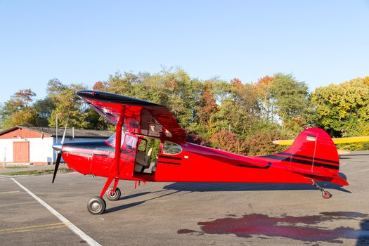 Bremgarten, Germany - October 22, 2016: A classic red Cessna 170 aircraft parked at the airport