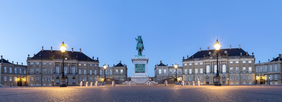 Copenhagen, Denmark - June 05, 2016: Panoramic Evening photography of Amalienborg Palace and the statue of Frederik V