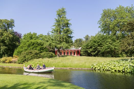 Frederiksberg, Denmark - June 07, 2016: People on a rowboat tour in Frederiksberg Park.