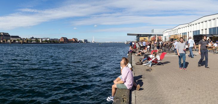 Copenhagen, Denmark - August 17, 2016: People enjoying a summer day at the Paper Island