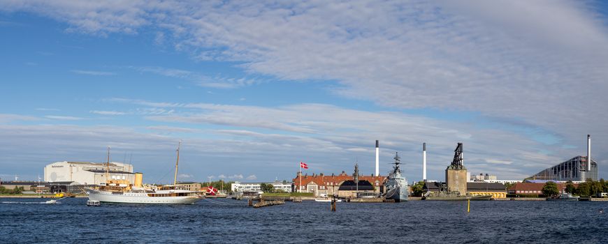 Copenhagen, Denmark - August 17, 2016: Panoramic view of Copenhagen harbor with the Royal Danish yacht and the Danish naval base