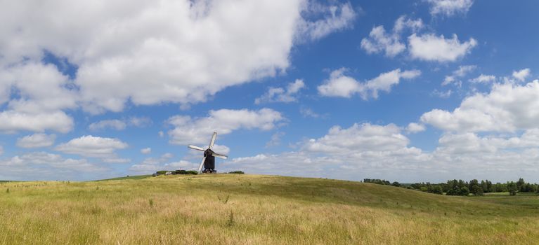 Hoejerg, Denmark - June 19, 2016: Panoramic view of Historic Danish windmill called Pibe Moelle.