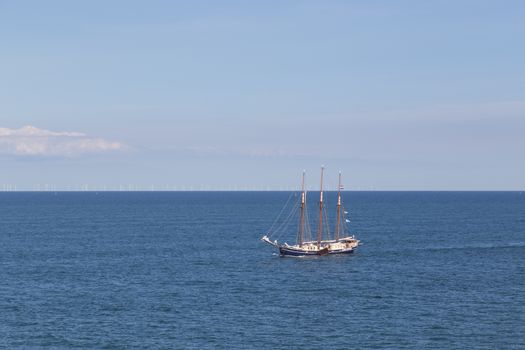 At Sea, Baltic Sea - July 26, 2016: A sailboat in the Baltic Sea between Puttgarden in Germany and Rodby in Denmark