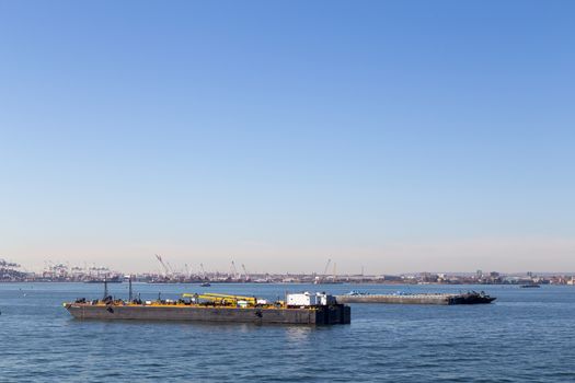 Bayonne, United States of America - November 18, 2016: Two oil barges sailing just outside of Bayonne Port.