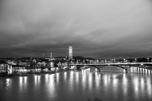 Basel, Switzerland - February 04, 2017: Panoramic view of the city and the river Rhine in black and white.