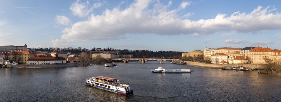 Prague, Czech Republic - March 15, 2017: Several cruise boats on the Vlata River