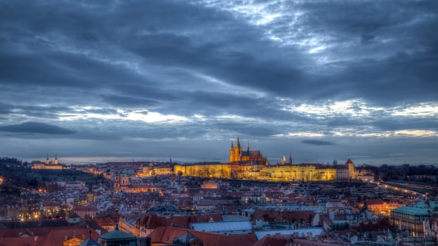 Prague, Czech Republic - March 20, 2017: View of the illuminated Prague Castle in the evening.