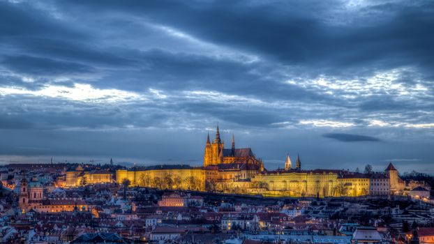 Prague, Czech Republic - March 20, 2017: View of the illuminated Prague Castle in the evening.