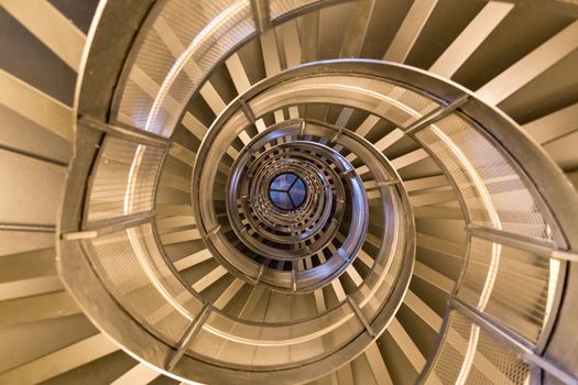 Innsbruck, Austria - June 8, 2018: View of the spiral staircase inside the historic Town Tower.