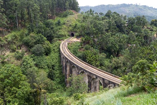 Demodara, Sri Lanka - August 4, 2018: People walking on the famous Nine Arch Bridge close to Ella