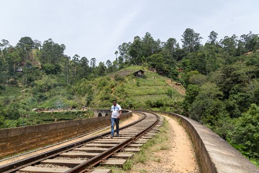 Demodara, Sri Lanka - August 4, 2018: People walking on the famous Nine Arch Bridge close to Ella