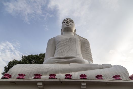 Kandy, Sri Lanka - August 10, 2018: Bahirawakanda Vihara Buddha Statue on top of a hill