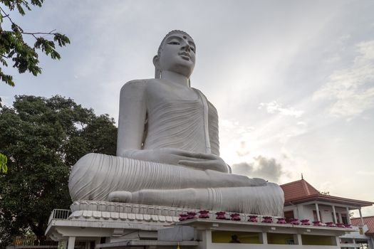 Kandy, Sri Lanka - August 10, 2018: Bahirawakanda Vihara Buddha Statue ocated on top of a hill