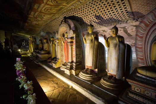 Dambulla, Sri Lanka - August 15, 2018: Buddha statues inside the historical Dambulla Cave Temple