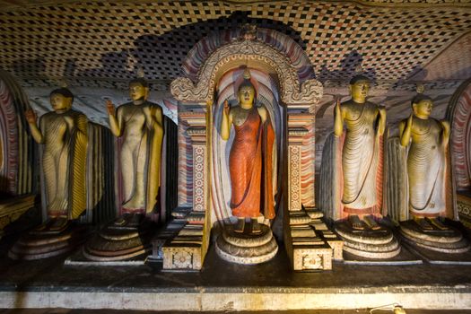 Dambulla, Sri Lanka - August 15, 2018: Buddha statues inside the historical Dambulla Cave Temple