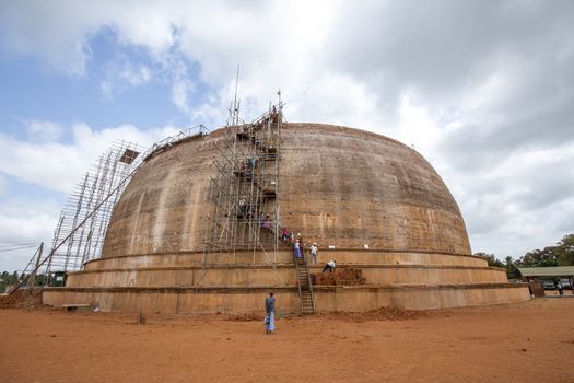 Anuradhapura, Sri Lanka - August 21, 2018: Construction site of the new stupa Sandahiru Seya. Anuradhapura is one of the ancient capitals of Sri Lanka, famous for its ruins of an ancientcivilization.