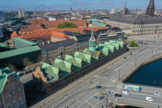 Copenhagen, Denmark - May 7, 2020: Aerial drone view of the old stock exchange building called Borsen