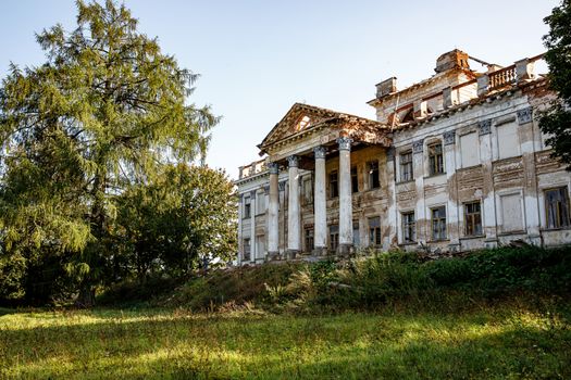 Old abandoned building with columns in nature