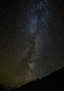 Part of the starry sky at night over the altai mountains.