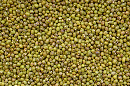 Background image of hot roasted mung beans Some of the skin will turn brown.