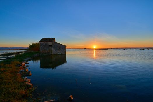 A splendid sunset in the lagoon of Valencia, Spain