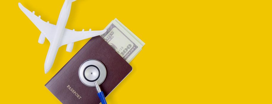 Stethoscope on passport with dollar banknote for care health of business impact from flu covid-19, financial and crisis economic of coronavirus, epidemic and prevention in global, banner website.