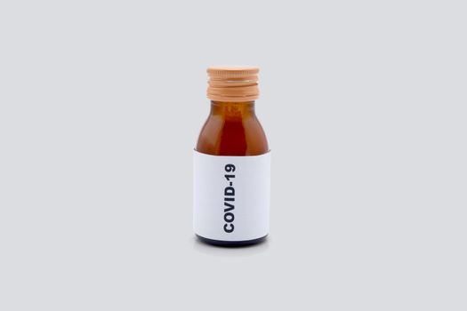 Sample medicine of covid-19 isolated on white background, coronavirus outbreak with pandemic, vaccine sample for analysis and research, medical and health care concept.