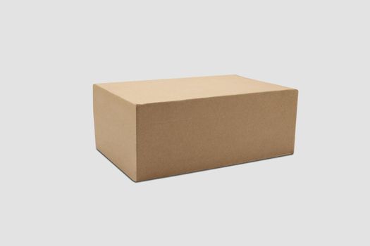 Mockup closed brown paper box isolated on white background, package and container, business with logistic, cardboard with packaging for parcel and delivery service, transportation concept.