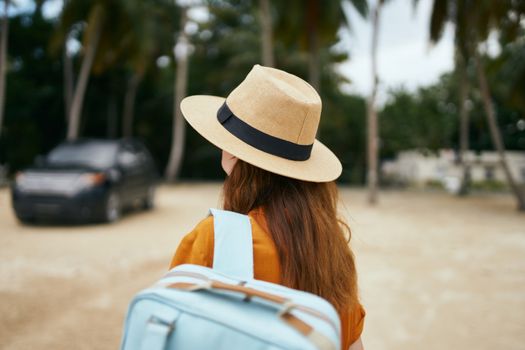 Backpack travel island hat orange dress