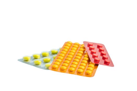 Group of medicines isolated on white background without shadow. Medicinal anti-inflammatory drugs in multi-colored packaging. Pharmacy pharmacological preparations.