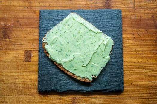 a delicious fresh bread with herb cream for the breakfast