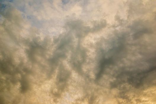 a dramatic cloudy sky in the dark autumn time
