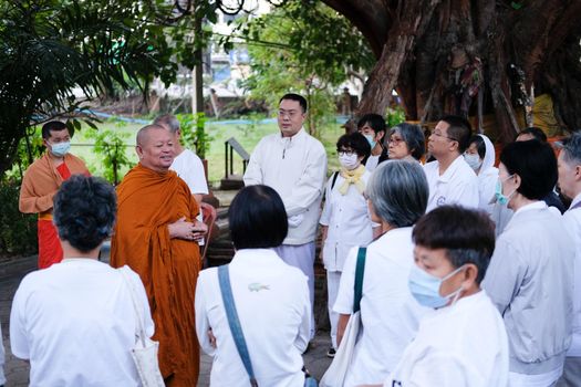 Chiang Mai, Thailand -  November 19, 2020: buddhist monk teaching dhamma to people in Chiang Mai university in Chiang Mai, Thailand on November 19, 2020.