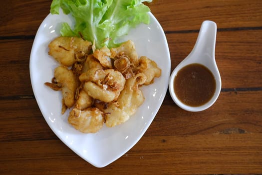 fried fish fillet with tamarind sauce