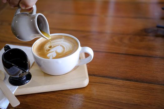 hot cappuccino mocha coffee with latte art