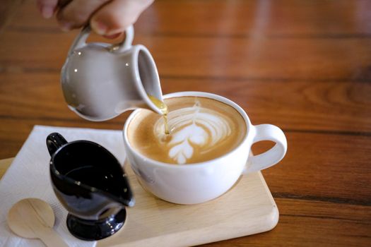 hot cappuccino mocha coffee with latte art