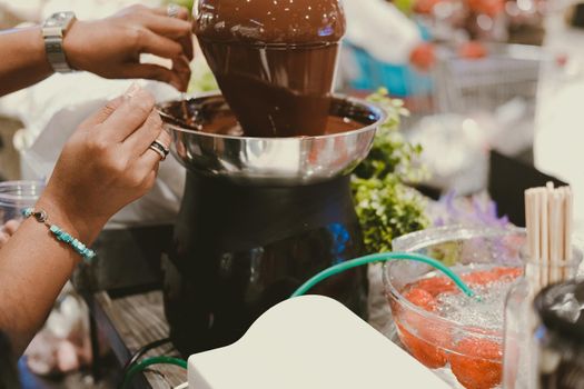 chocolate fondue fountain dripping sauce
