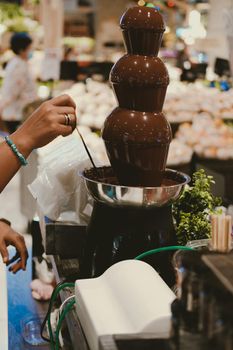 chocolate fondue fountain dripping sauce