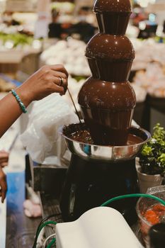chocolate fondue fountain dripping sauce