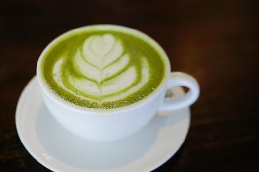 hot japanese matcha green tea with latte art.