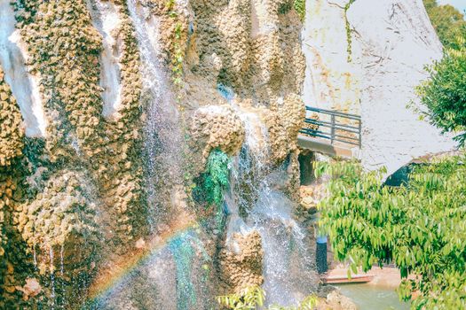 manmade waterfall park. flowing water stream
