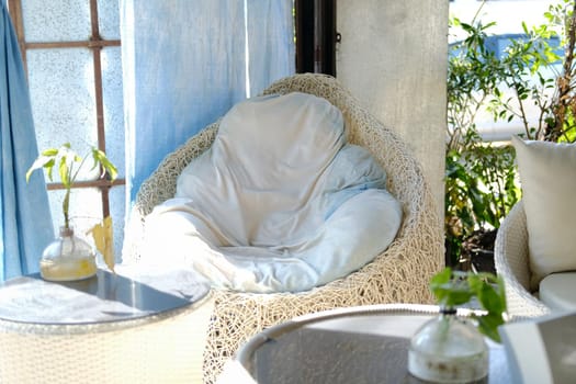white cushion pillow on chair sofa at patio at home