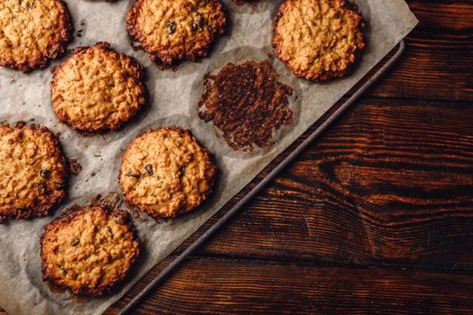 Homemade Oatmeal Cookies with Raisins on Parchment Paper. View from Above.