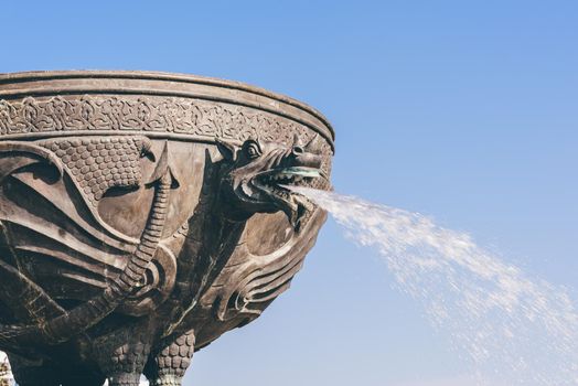 Dragon fountain in Kazan city on blue sky background