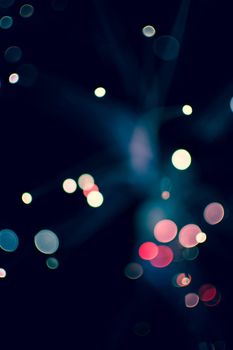 Colorful bokeh light celebrate at night, defocus light abstract background.